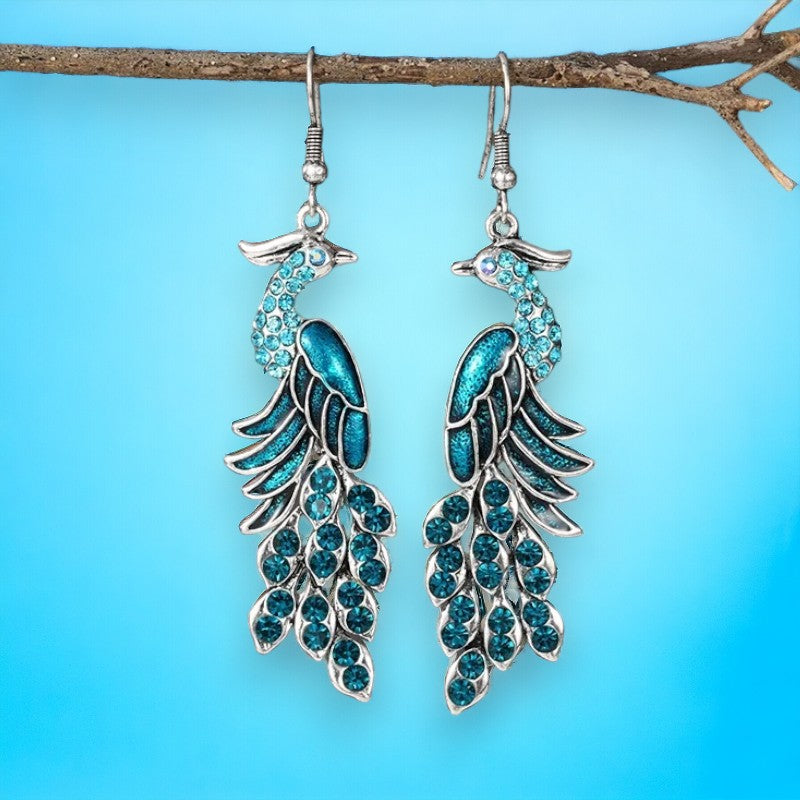 Hangoorbellen met pauw