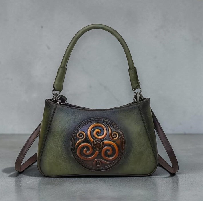 Compacte handtas met Triskelion