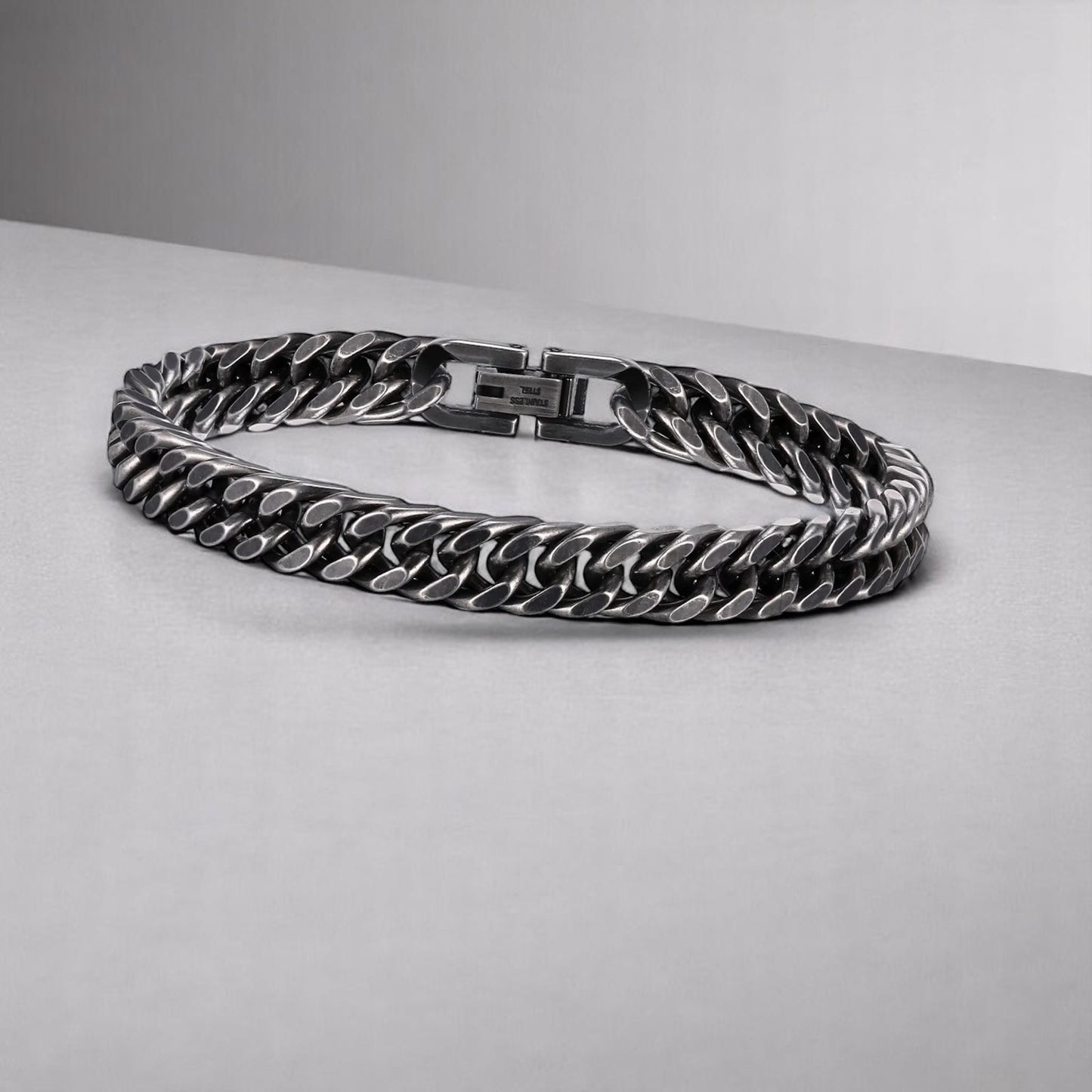 Donkere stalen schakelarmband 8mm breed