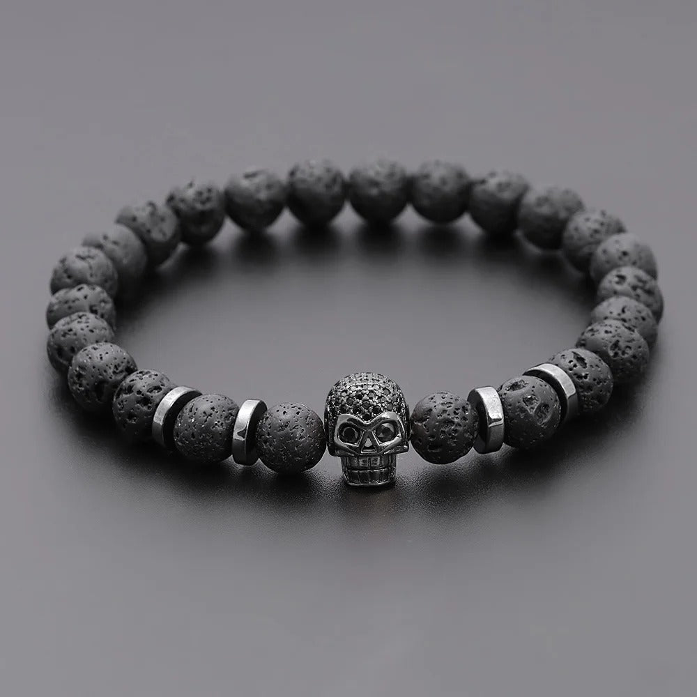 Elastische armband met lavasteen met stalen kralen en Skull