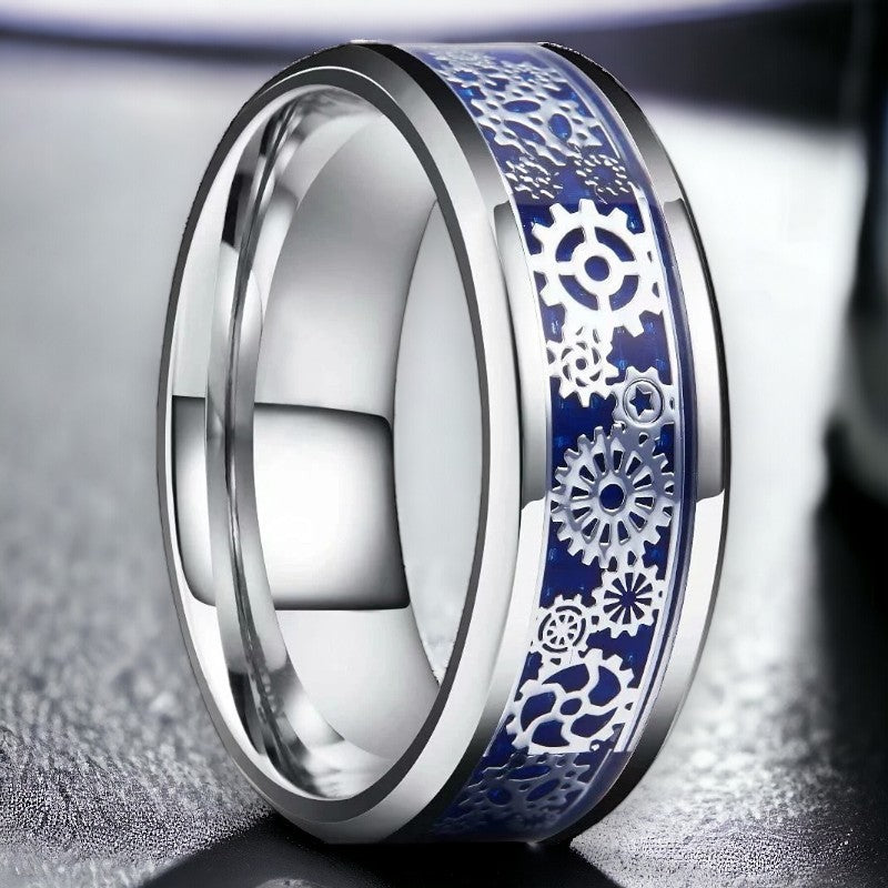 Stalen herenring met radertjes erin verwerkt