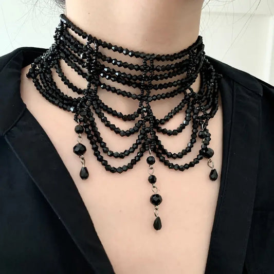 Brede zwarte kralenchoker