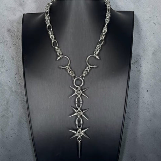 Stalen Punk ketting met lang uitlopend stuk met crosspins en halve cirkels