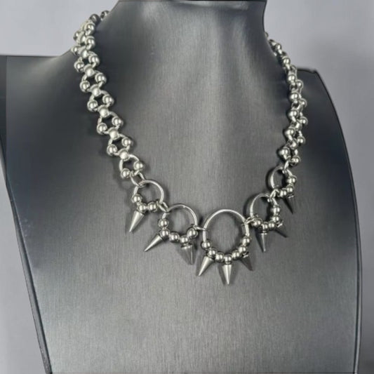 Groffere schakelketting met cirkels, bollen en pinnen