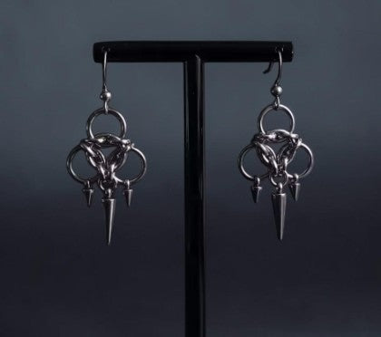 Punk earrings with circles and 2 small and 1 larger pin