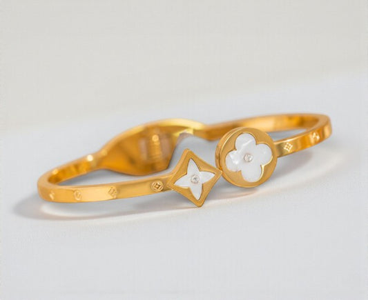 Stijve scharnierarmband met klavertje en sterretje