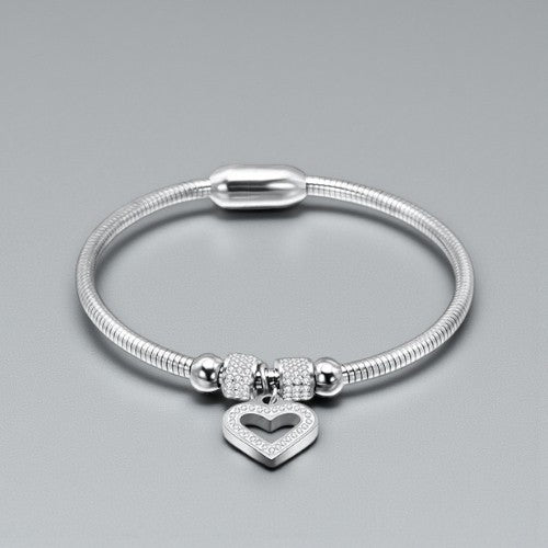 Stijve stalen armband met magneetsluiting en bedelhartje