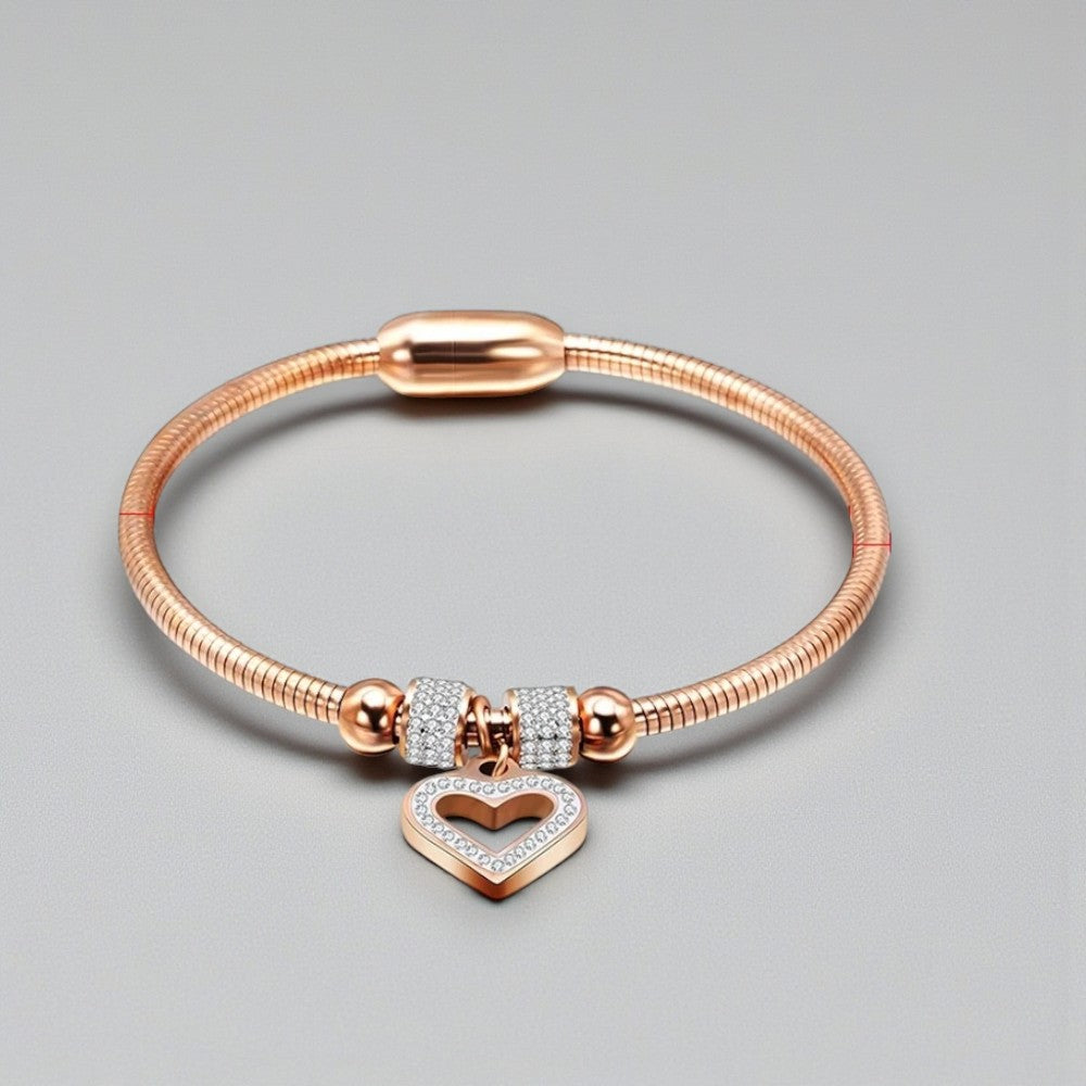 Stijve stalen armband met magneetsluiting en bedelhartje