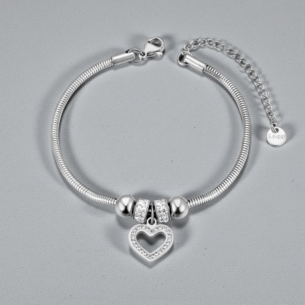 Soepele slangenarmband met verschillende bedels