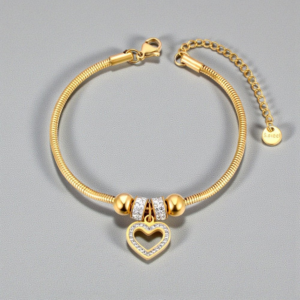 Soepele slangenarmband met verschillende bedels